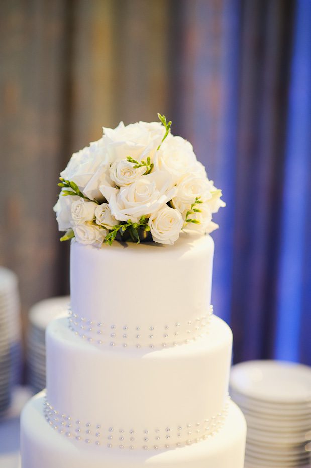 8_wedding_cake_blue_uplighting weddings austin 8 wedding cake blue uplighting Austin Wedding Photography | Saint Austins Cathedral and Texas Federation of Womens Club Mansion Wedding