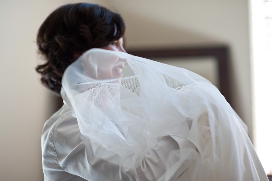 mom_helping_bride_with_veil weddings texas hill country AMC1479 Hill Country Texas Vineyard Wedding Photographer | Duchman Family Winery Wedding