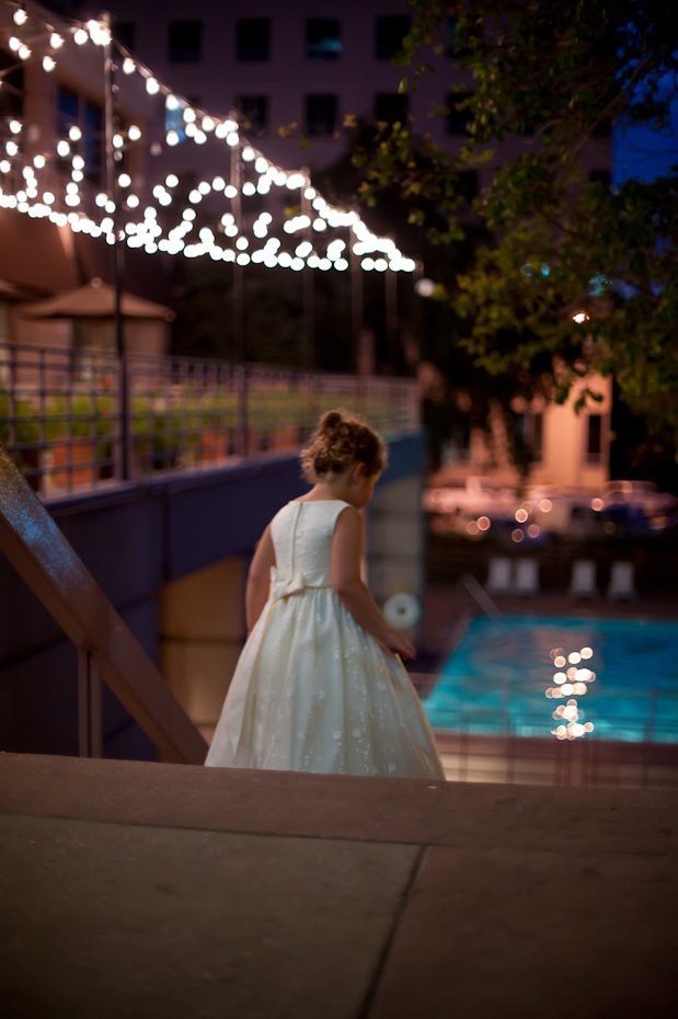 weddings austin  flower girl walking down stairs wedding1 Austin Wedding Photographer | Night time candlelight ceremony