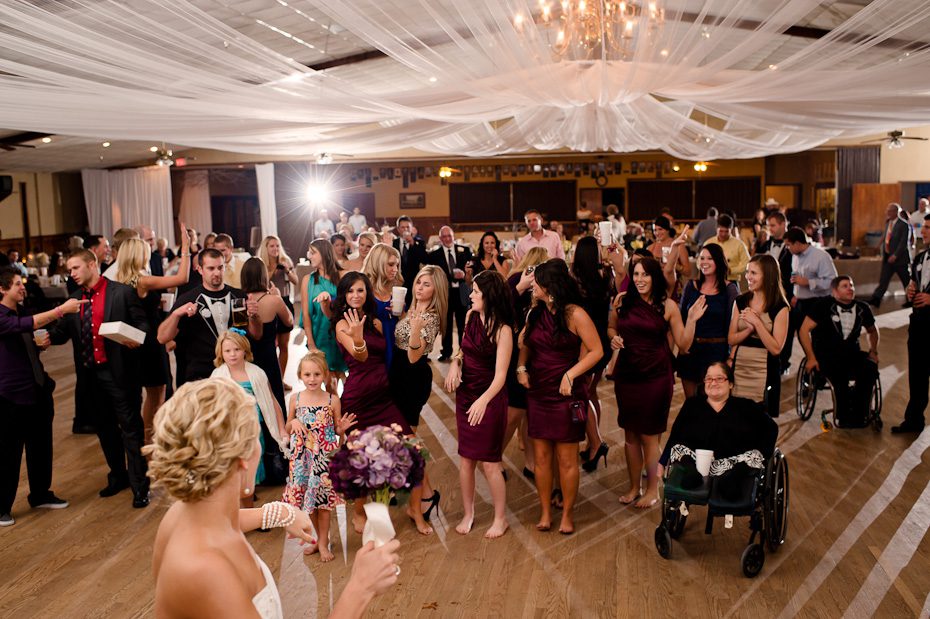bride_getting_ready_toss_bouquet weddings ennis austin Germenis 1391 Austin Wedding Photographer | Central Texas Autumn Wedding